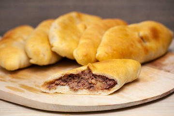 Hotcakes with fill, traditional English Georgian khachapuri Russian appetizer