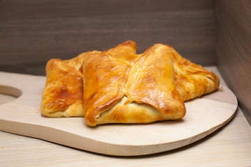 Hotcakes with fill, traditional English Georgian khachapuri Russian appetizer