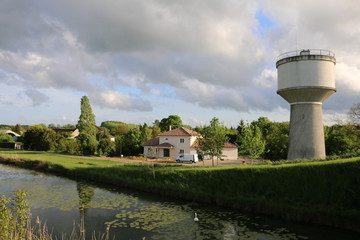Canal de la Haute-Seine. Abandoned canal in central, northeastern France. Water tower. Clesles,...