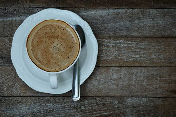 Special recipe hot latte in white coffee cup and space for write wording served in a restaurant, popular drink for meeting place, value added, coffee shop is very big and fast growing business