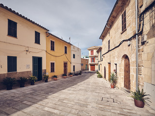 Alcudia old town empty street, color toning applied, Mallorca, Spain.