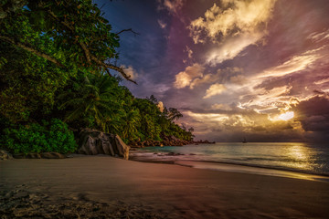 Fototapeta na wymiar sunset on paradise beach at anse georgette, praslin, seychelles 4