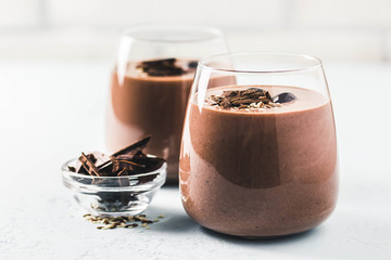 Chocolate frozen cherry chia seeds smoothie. Selective focus, space for text.