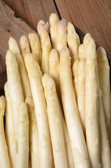 white asparagus on old table