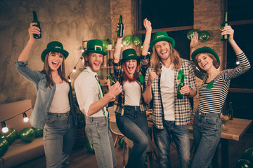 Irish national celebrating leprechaun hats traditional beer brew brewery yelling company gathering...