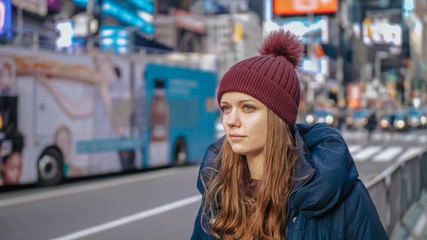 Young beautiful woman in the streets of New York for sightseeing