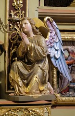 Angel statue on the altar in the church of Saint Matthew in Stitar, Croatia
