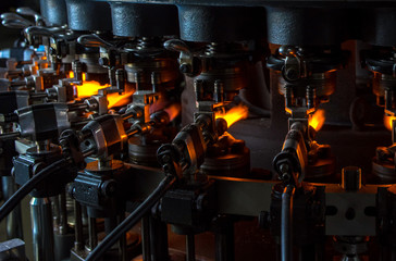 Factory equipment for the production of medical ampoules.