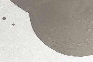 Obraz premium concrete floor. on it departure fluid to align the horizon. close-up. there is toning