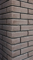 Brown modern brick column, background, texture, close-up