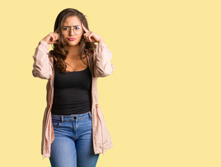 Full body young curvy woman doing a concentration gesture