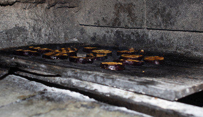 Eggplant slices are grilled in the oven, grilled vegetables, close-up, brinjal