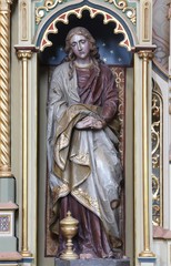 Fototapeta premium Saint Mary Magdalene statue on the Sacred heart of Jesus altar in the church of Saint Matthew in Stitar, Croatia.