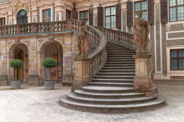 Fototapeta na wymiar Rastatt, Germany – stone, antique stairs of the old castle.