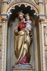 Virgin Mary with baby Jesus statue on altar of Our Lady in the church of Saint Matthew in Stitar, Croatia.