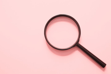 İsolated magnifier on pink background