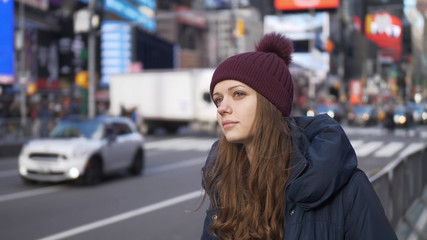 Young beautiful woman in the streets of New York for sightseeing