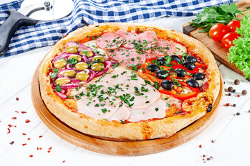 Close up view on pizza on white wooden background with ingridients. Italian cuisine. Ready to Eat. Restaurant, food menu, recipe, cafe concept. Lifestyle with copy space