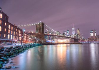 View on Financial district at night from Dumbo with long exposure	