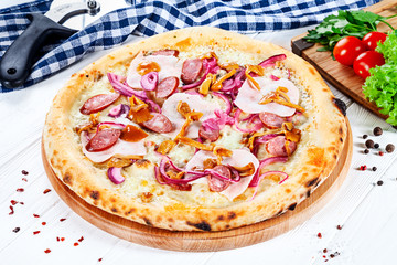Close up view on pizza on white wooden background with ingridients. Italian cuisine. Ready to Eat. Restaurant, food menu, recipe, cafe concept. Lifestyle with copy space