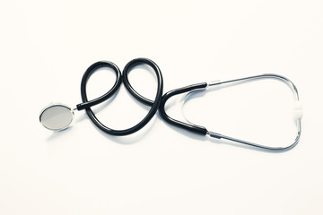 Medical concepts.Stethoscope isolated on blue background