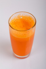A glass with fresh pumpkin juice