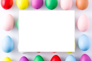 Easter eggs pattern background with empty frame. Copyspace