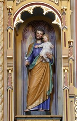 St. Joseph holding baby Jesus, altar of St. Anthony the Great in the church of Saint Matthew in...