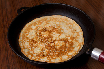 Thin pancakes with crispy crust. Maslenitsa. Pancakes for breakfast and carnival.
