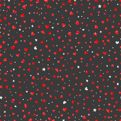 Fototapeta na wymiar Valentines day abstract seamless background with red white and silver confetti laying on a dark floor
