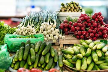 Table with fresh vegetables on the market - picture