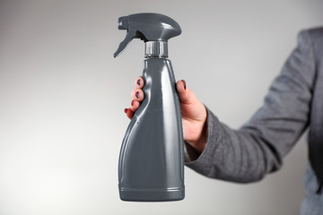 Woman hand with product and free space for your decoration. 