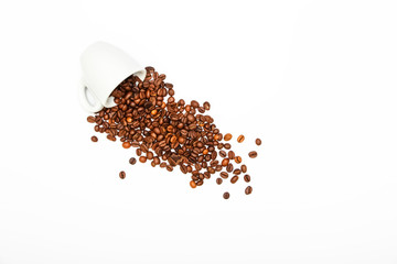 Roasted coffee beans isolated on white background. Top view Coffee grains on a white background.