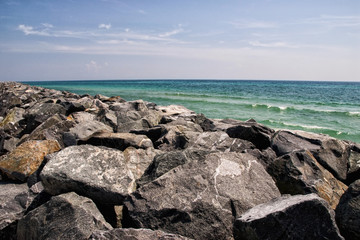 Fototapeta na wymiar Rock and Stone Groin at Cape San Blas Florida USA