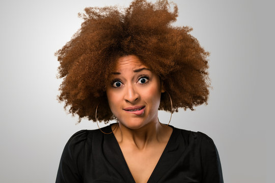 Afro woman realizing about something