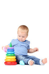 Baby boy with colorful plastic toy isolated on white background