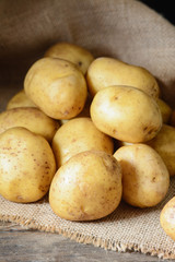 Raw potato. Rustic style