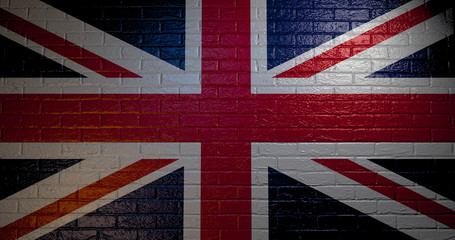 United Kingdom flag on the brick wall.