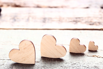 Brown hearts on grey wooden table