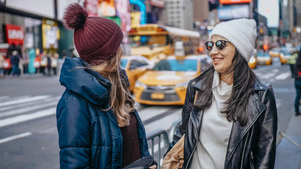 Fototapeta premium Two friends enjoy their vacation trip to New York
