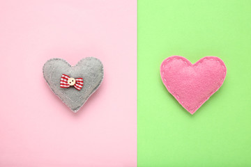 Fabric hearts on colorful background