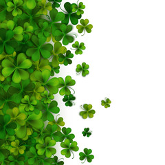 Saint Patrick's day background, realistic green shamrock leaves, vector illustration