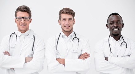 Fototapeta premium three successful physician therapists standing together