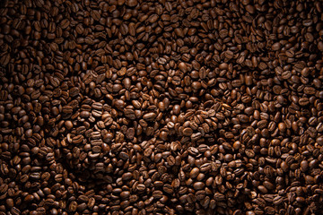 grains of coffee on a black background