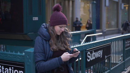 Young woman in New York speaks on the phone