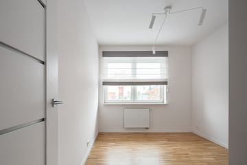 Empty room with wooden floor