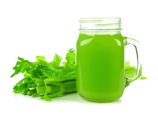 Healthy celery juice in a mason jar glass isolated on a white background.