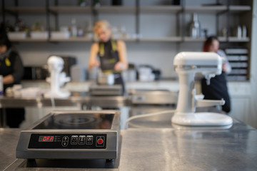 Kitchen scales on the background of the kitchen