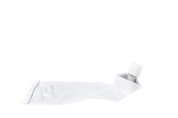 Close up of aluminum tube isolated on white background. Cosmetic or medicine gel.