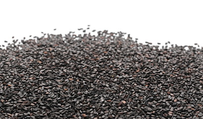 Black organic sesame seeds isolated on white background